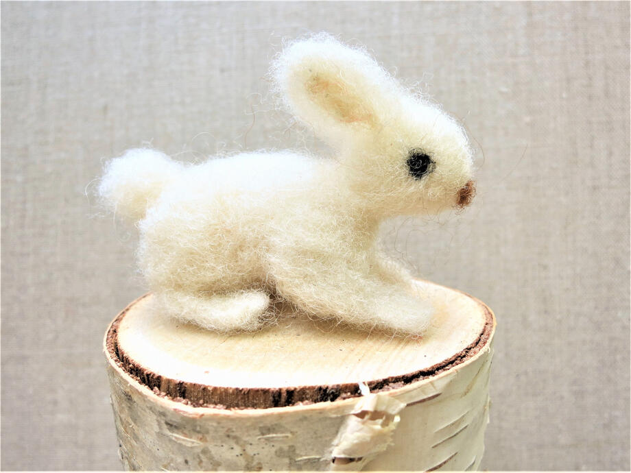 image of a small white needle-felted rabbit